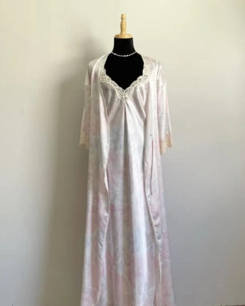 Blush printed satin nightgown and robe set with lace trim, on a dress form